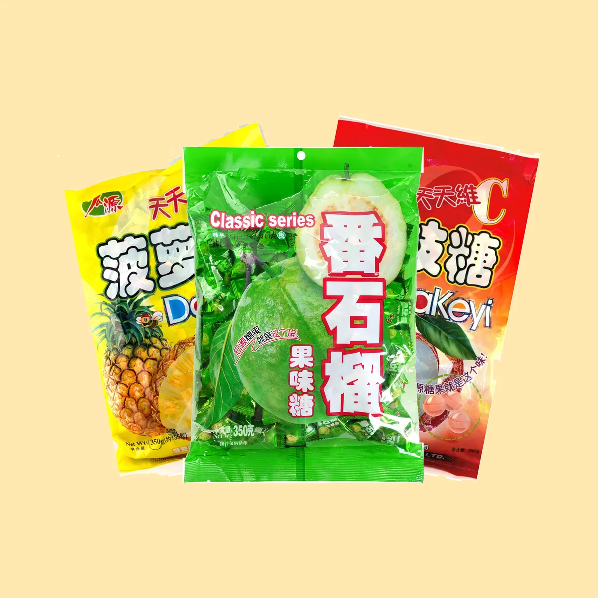 Three bags of Hongyuan hard candy fanned out: pineapple, guava and lychee